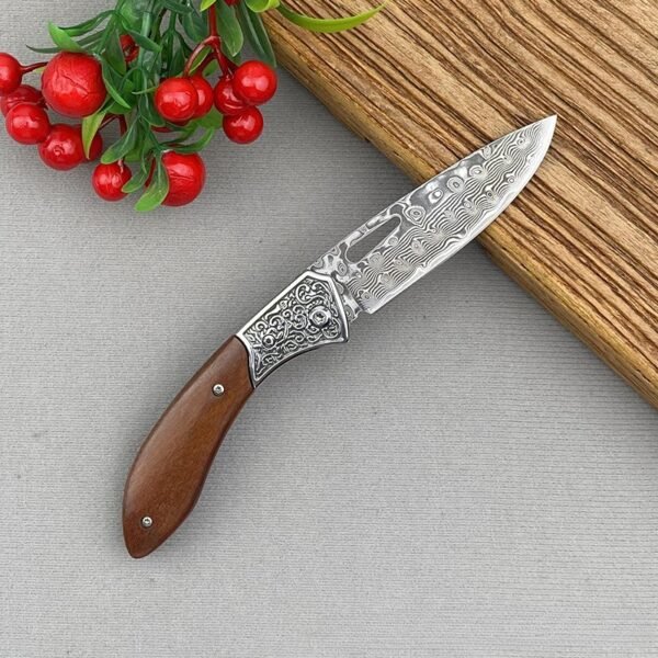 compact multi-tool knife with rosewood handle